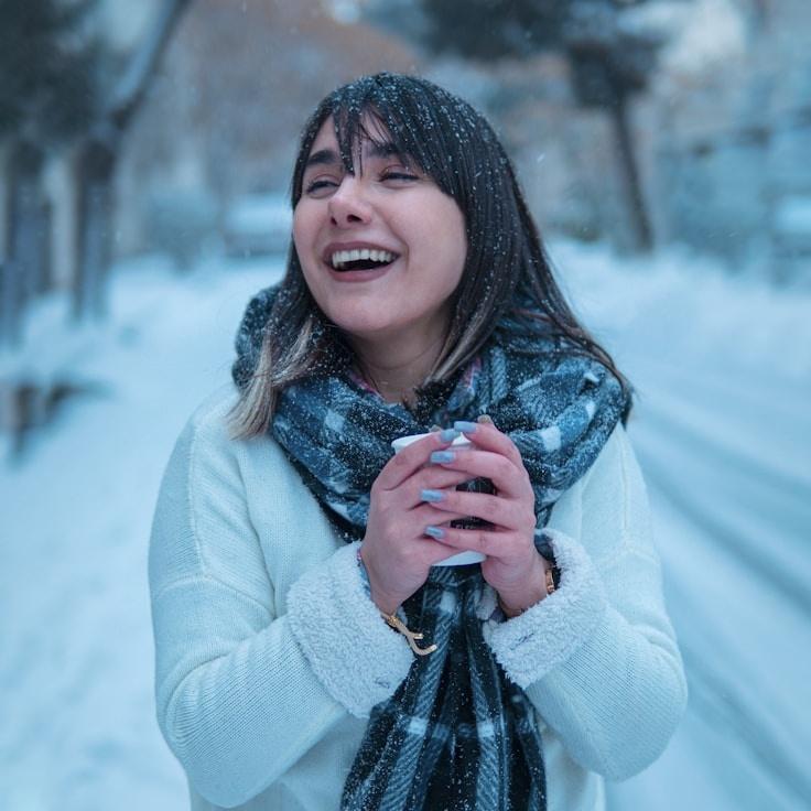 Kaveri Mehta, Lead Design Curator at SprigHorizonLumen, reviewing corporate floral arrangements